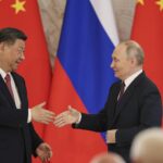 What was Trump’s message to China and Russia with attack on Iran